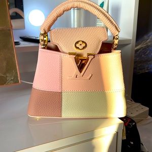 Beautiful pastel color block bag.